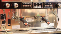 Complete Front look of Astoria Pratic Avant showing two steam wands one water dispenser indicator pressure gauge & touchpad